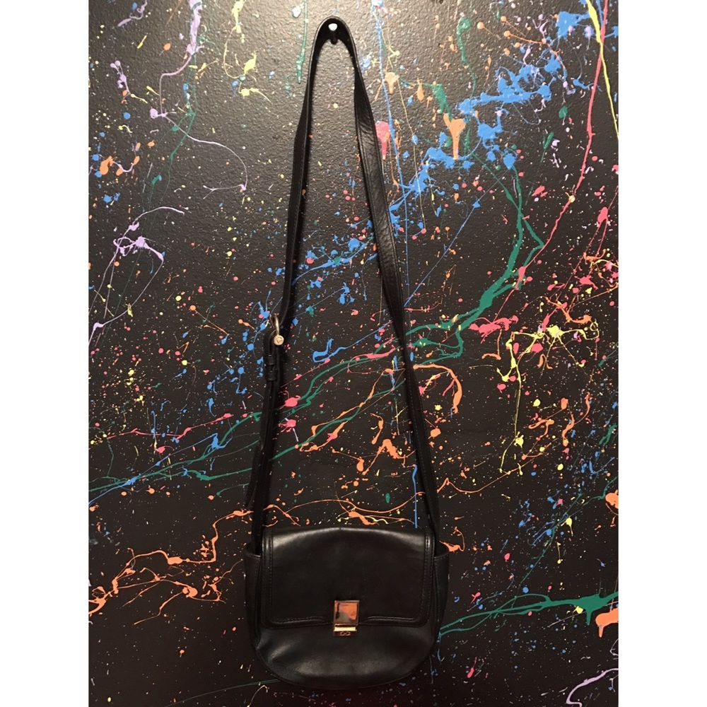Adorable black cross body purse